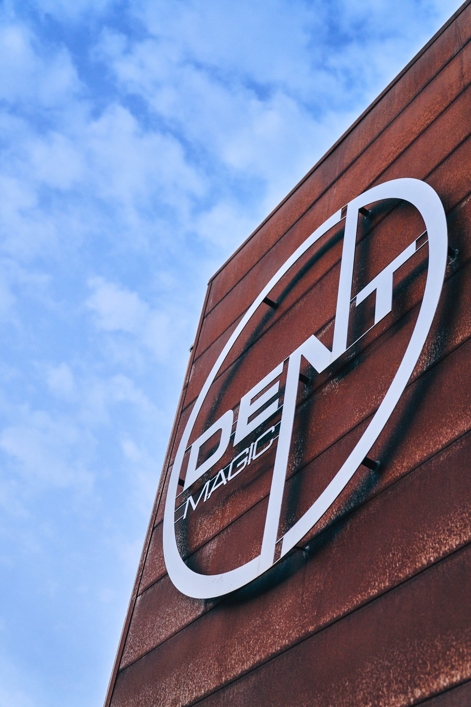 Dent Magic signage on the shop facade in Kalispell, Montana